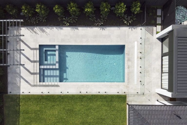 RMS-TRADERS-LONDON-GREY-SANDBLASTED-LIMESTONE-PAVING-AND-POOL-COPING-FOR-HAMPTON-VIC-INSTALL-2-scaled