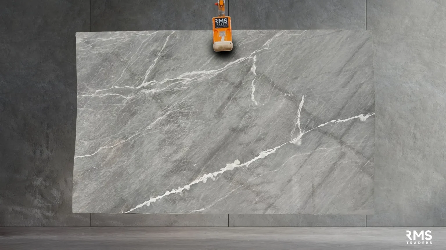 Premium Earth Grey Marble Slab from RMS-Traders, showcasing deep charcoal and smoky grey veining for luxury kitchen countertops and bathroom vanities.