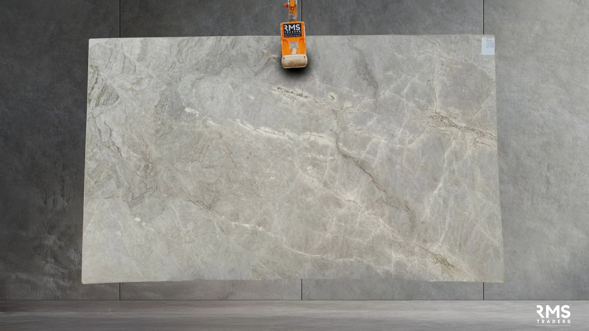 Exquisite Perla Venata Quartzite slab by RMS-Traders, featuring soft creamy white tones with delicate gold and sand-colored veining, ideal for luxury kitchen island benchtops.
